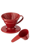 red plastic dripper coffee maker
