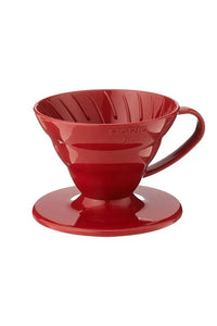 red plastic dripper coffee maker